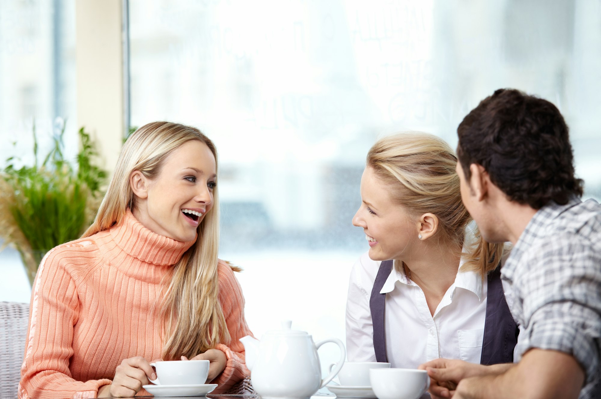 Attractive youth in cafe